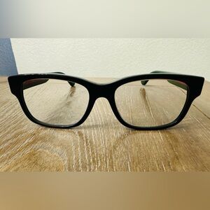 Gucci reading glasses. Lens has script.